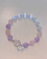Bracelet imitation œil de chat cristal de papillon