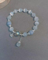 Bracelet imitation œil de chat cristal de papillon