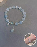 Bracelet imitation œil de chat cristal de papillon