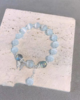 Bracelet imitation œil de chat cristal de papillon