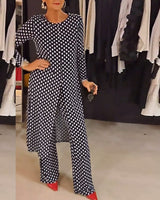 Costume élégant fendu à pois