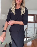 Robe élégante plissée à col rond de couleur unie