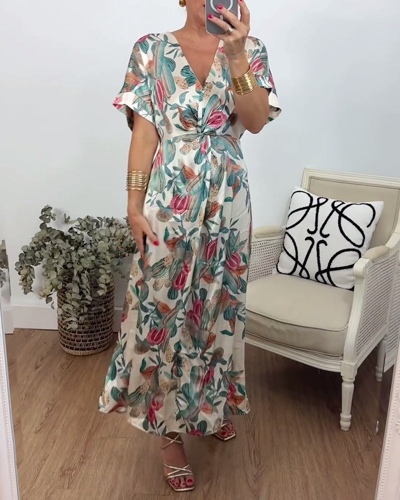 Robe élégante torsadée à col en V et imprimé botanique