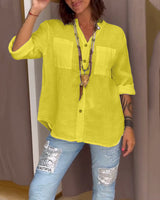 Chemise de couleur unie avec poches et boutons simples