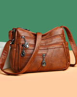 Sac bandoulière en cuir souple avec multipoches