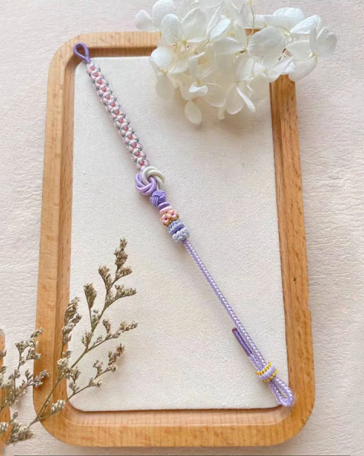 Bracelet avec noeud de fleurs de pêcher