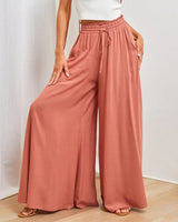 Pantalon taille haute de couleur unie