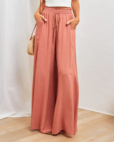 Pantalon taille haute de couleur unie