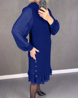 Robe élégante à pois et manches longues