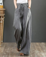 Pantalon large taille haute de couleur unie
