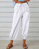 Pantalon taille haute bouton neuf points