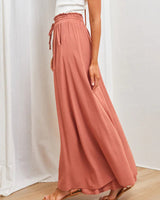 Pantalon taille haute de couleur unie