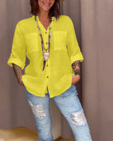 Chemise de couleur unie avec poches et boutons simples