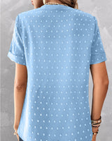 T-shirt avec col en V et bouton