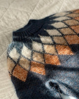 Pull à jacquard losange géométrique