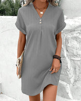 Robe col V de couleur unie