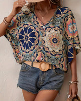 Blouse à demi-manches boutons avec col en V et imprimé rétro