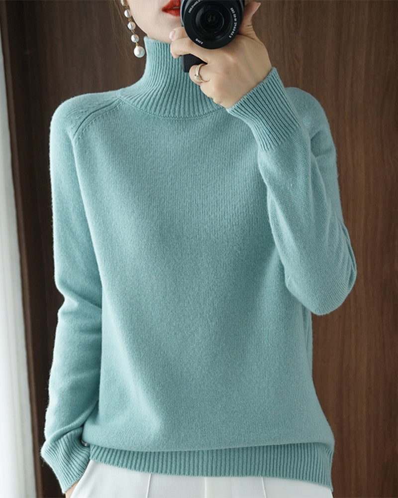 Pull simple à manches longues et col haut de couleur unie