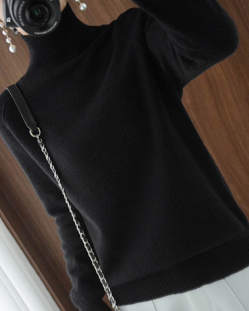 Pull simple à manches longues et col haut de couleur unie