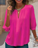 Blouse unie plissée col V