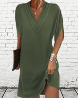 Robe élégante à manches fendues de couleur unie