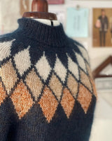 Pull à jacquard losange géométrique
