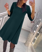 Robe unie avec nœud au dos