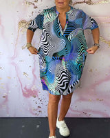 Robe à poches imprimée colorée avec col en V et demi-manches