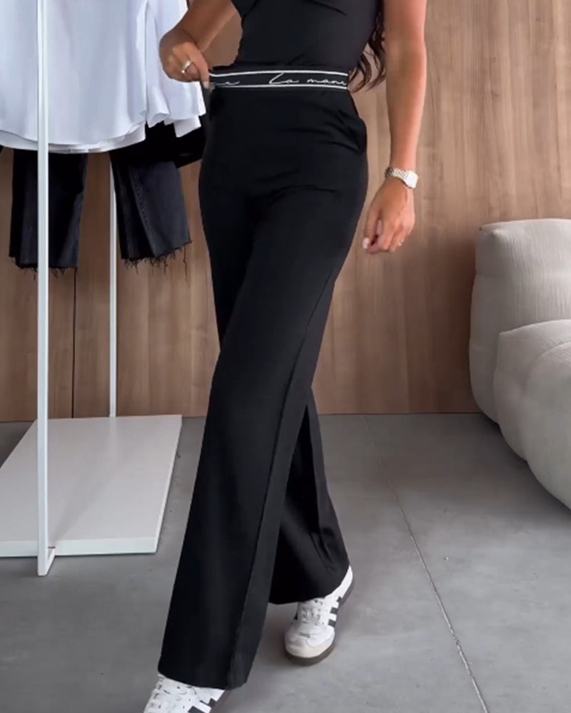 Pantalon droit décontracté de couleur unie avec poche zippée