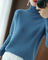 Pull simple à manches longues et col haut de couleur unie