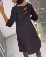 Robe unie avec nœud au dos