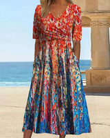 Robe de villégiature imprimée avec poches et col en V