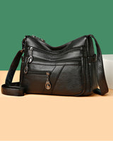 Sac bandoulière en cuir souple avec multipoches