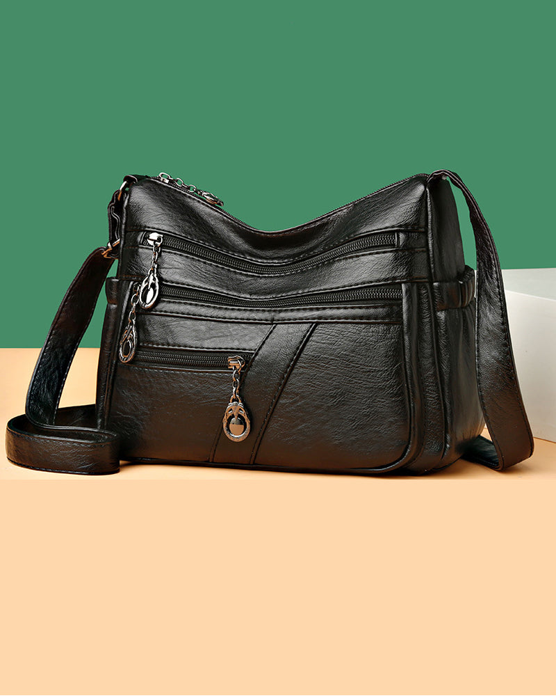 Sac bandoulière en cuir souple avec multipoches