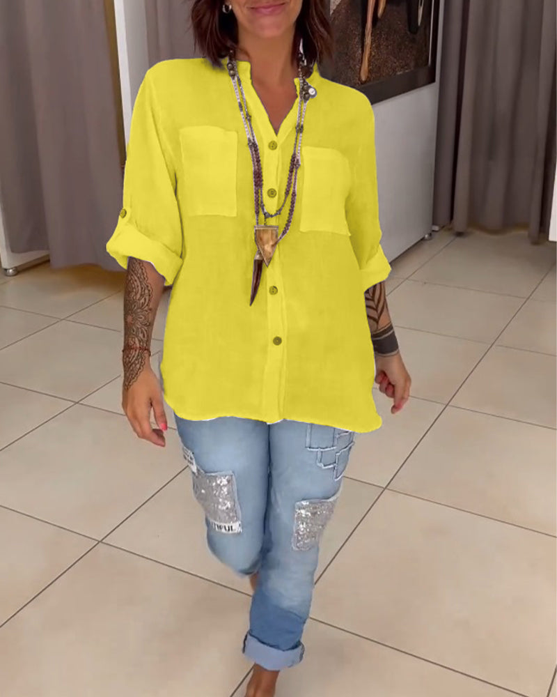 Chemise de couleur unie avec poches et boutons simples