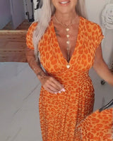 Robe élégante à imprimé léopard et col en V
