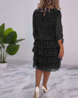 Robe élégante superposée à imprimé pois
