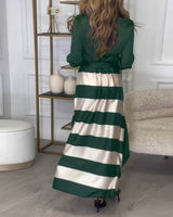 Robe élégante à rayures et à bretelles