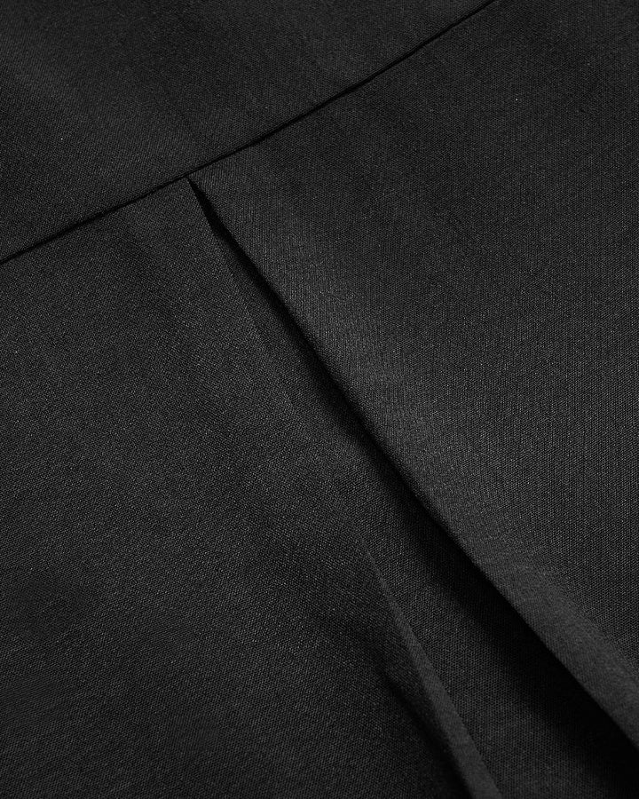 Haut décontracté à empiècements et boutons à sequins