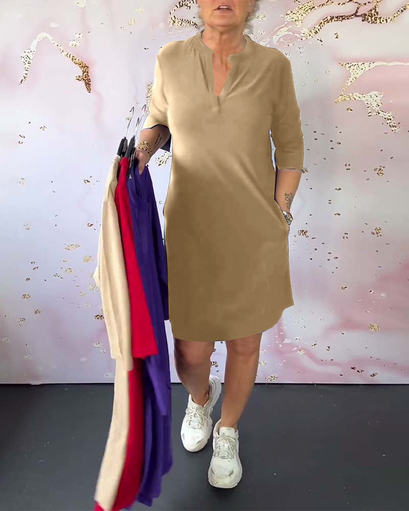 Robe à couleur unie et col en V