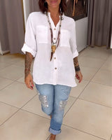 Chemise de couleur unie avec poches et boutons simples