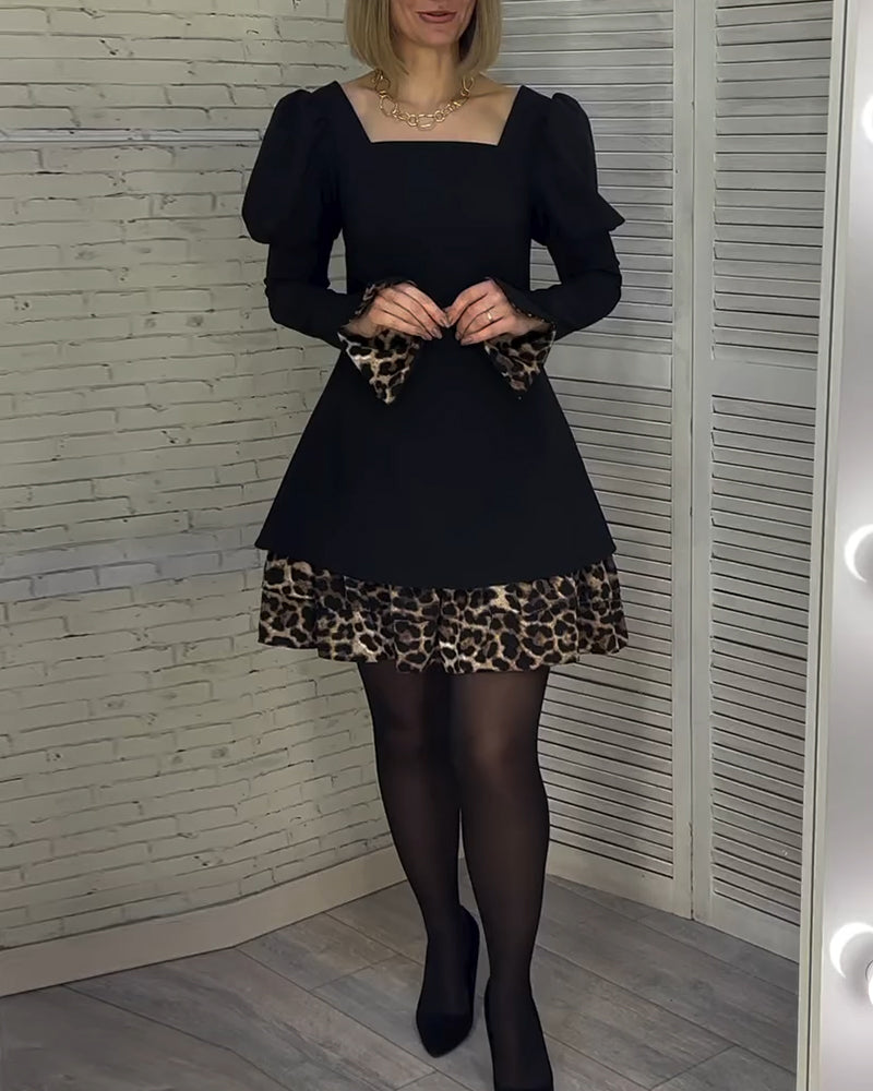 Robe élégante à manches bouffantes et imprimé léopard