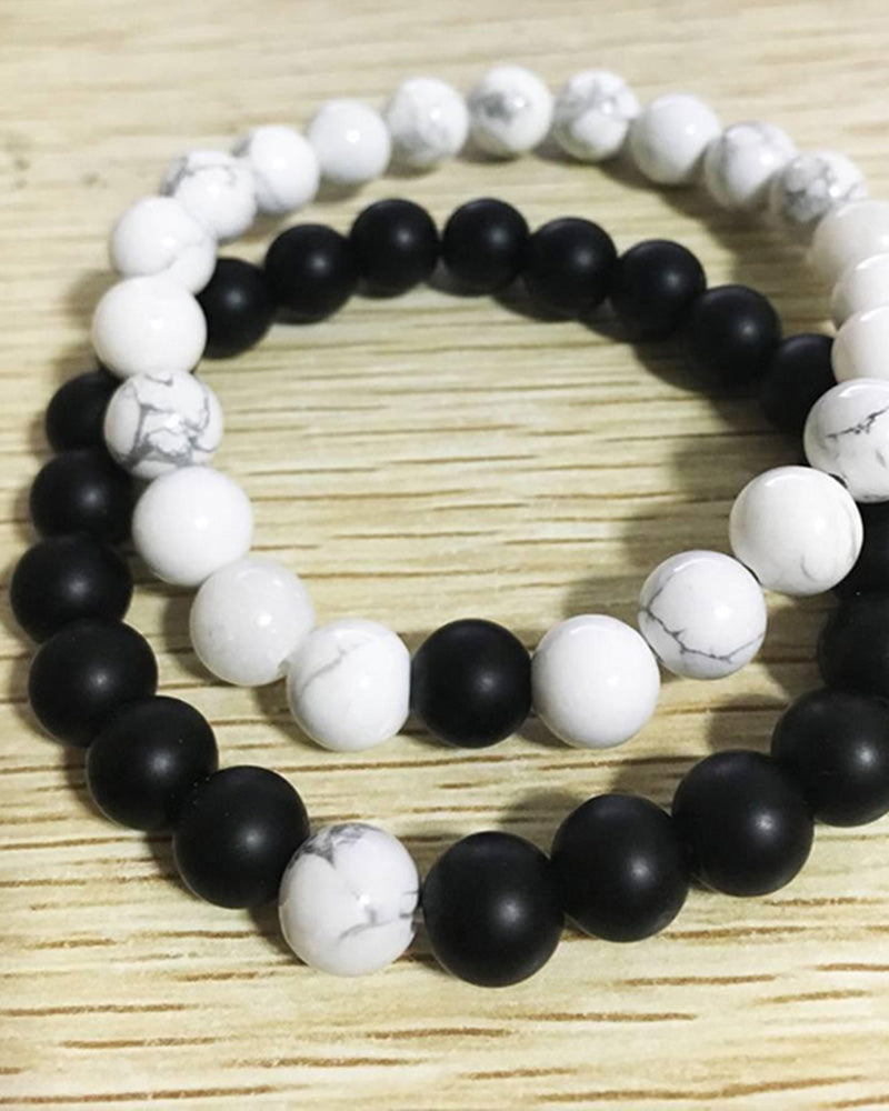 Ensemble de bracelets pour couple tissés en perles noires et blanches
