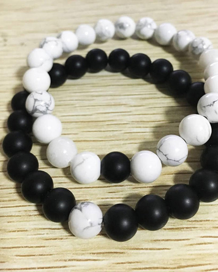 Ensemble de bracelets pour couple tissés en perles noires et blanches