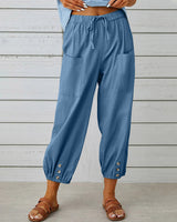 Pantalon taille haute bouton neuf points
