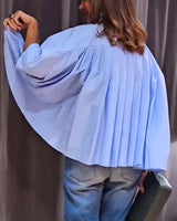 Chemise décontractée à poches plissées de couleur unie