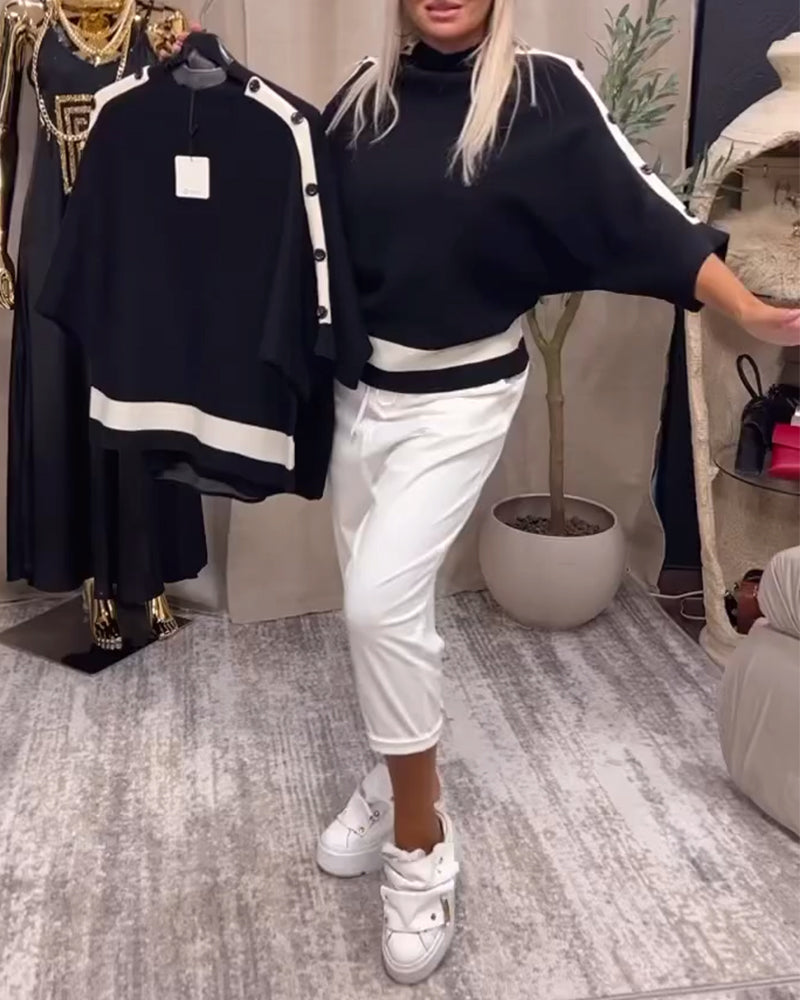 Pull boutonné color block