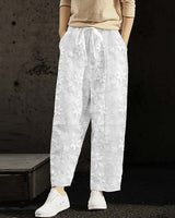 Pantalon décontracté de couleur unie à lacets brodés de fleurs