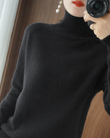 Pull simple à manches longues et col haut de couleur unie
