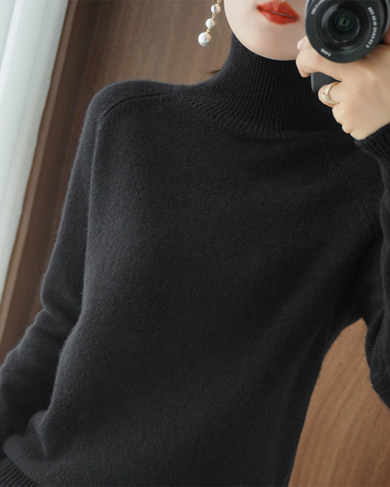 Pull simple à manches longues et col haut de couleur unie